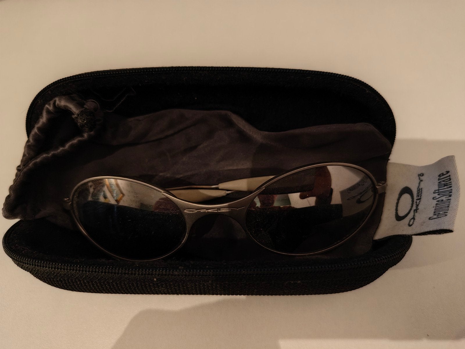 Oakley Titanium T-wire Zonnebril - Nieuwstaat, Zonnebril, Nieuw, Ophalen of Verzenden, Oakley