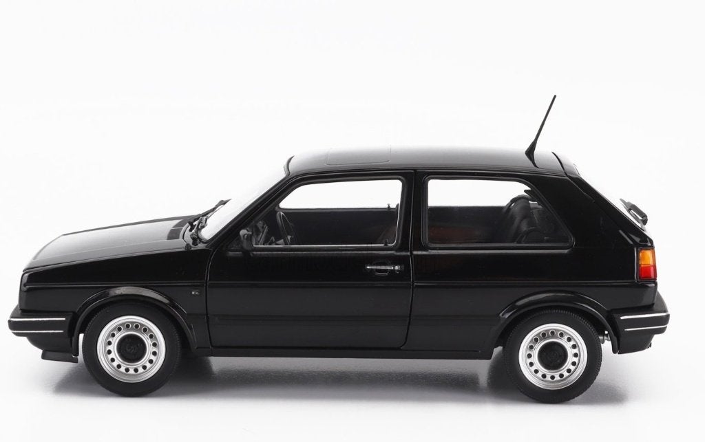 Vw Golf 2 CL 1988 zwart 1:18, Hobby en Vrije tijd, Modelauto's | 1:18, Auto, Norev, Ophalen of Verzenden, Norev.com