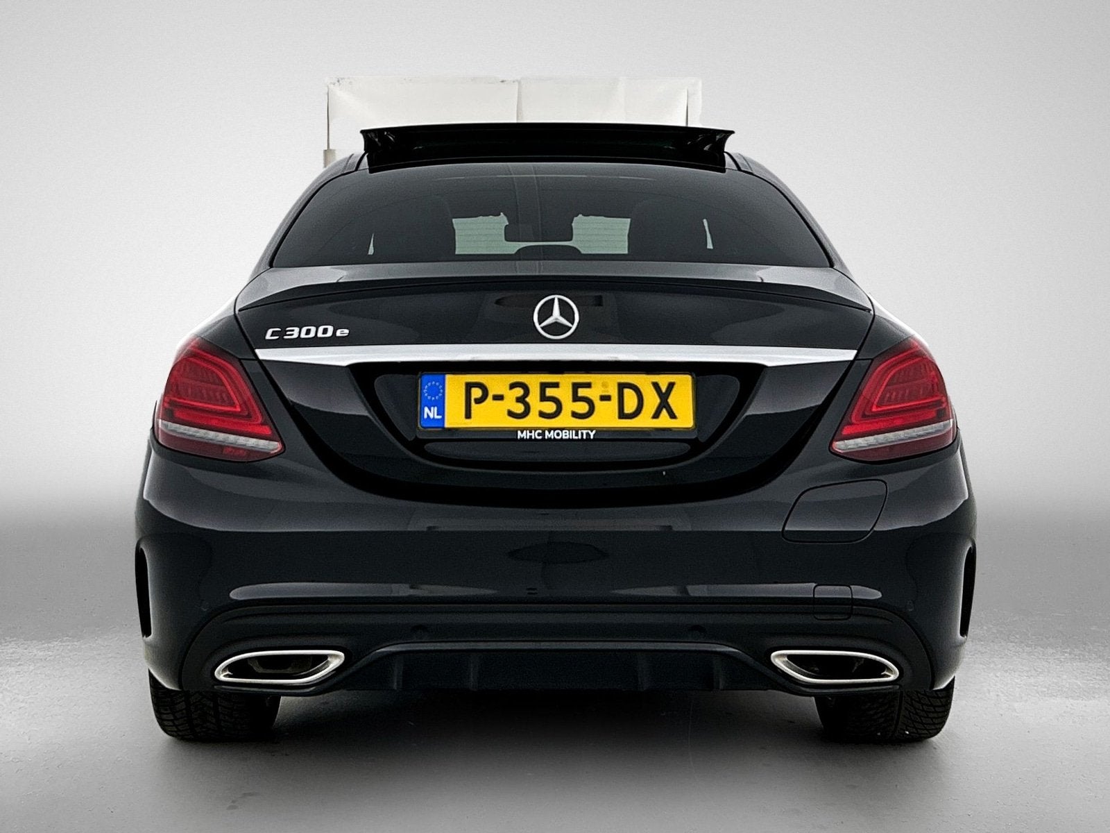 Mercedes-Benz C-Klasse 300 e Business Solution AMG Limited |, Auto's, Zwart, Bedrijf, Hybride Elektrisch/Benzine, Sedan