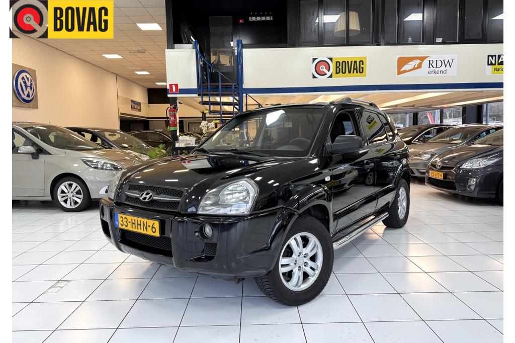 Hyundai Tucson 2.0i Dyn. Executive Bovag garantie Airco, Auto's, Hyundai, 13 km/l, Parkeersensor, Stof, Gebruikt
