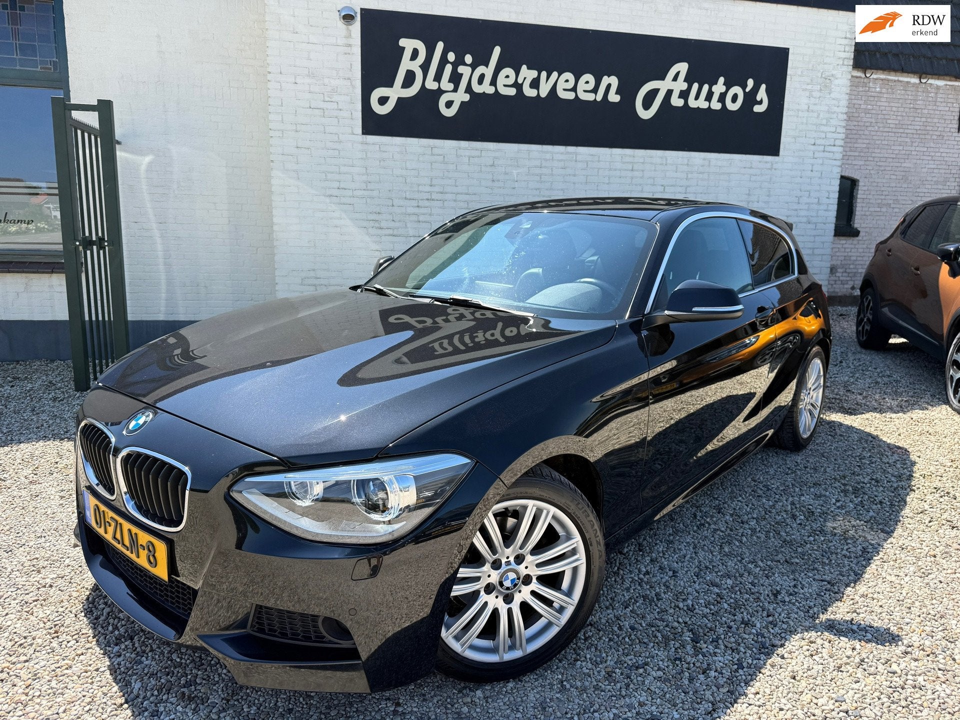 BMW 1-serie 114i Business+ Clima | Leer | Navi | LM | PDC |, 1-Serie, Euro 5, Achterwielaandrijving, Gebruikt