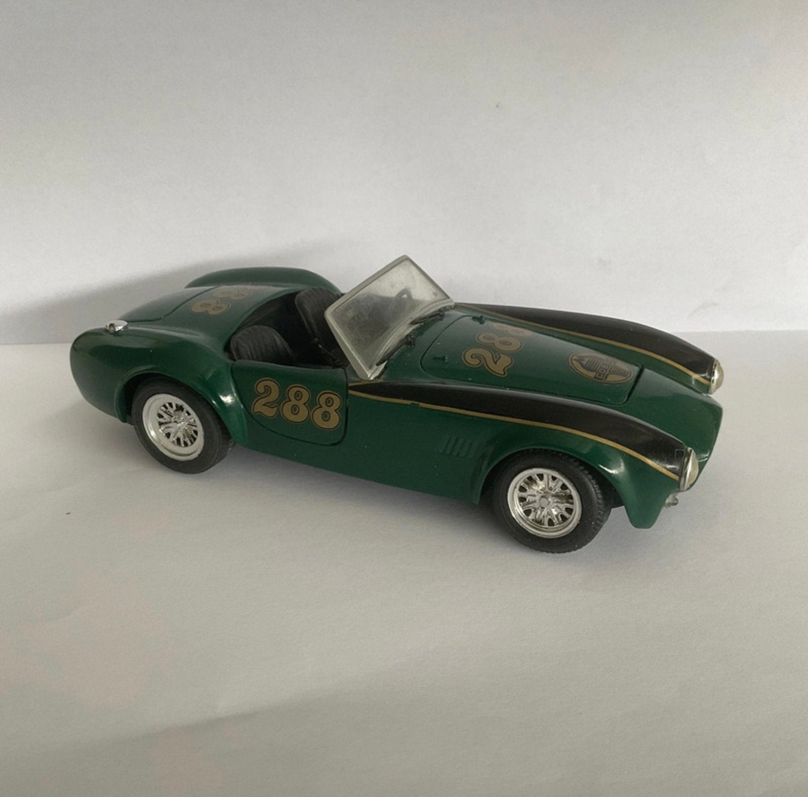 Ford Shelby Cobra 427 modelauto 1:24, Ophalen of Verzenden, Zo goed als nieuw, Auto, Revell
