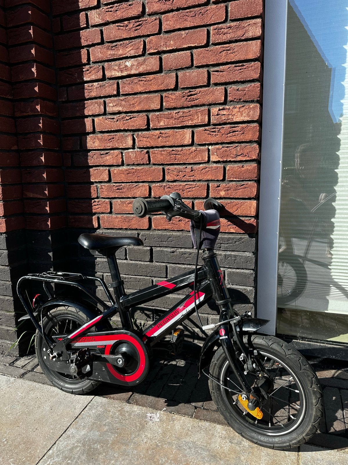Pegasus Primo Kinderfiets Zwart/Rood - 12 inch, Ophalen, Gebruikt, Terugtraprem, Minder dan 16 inch