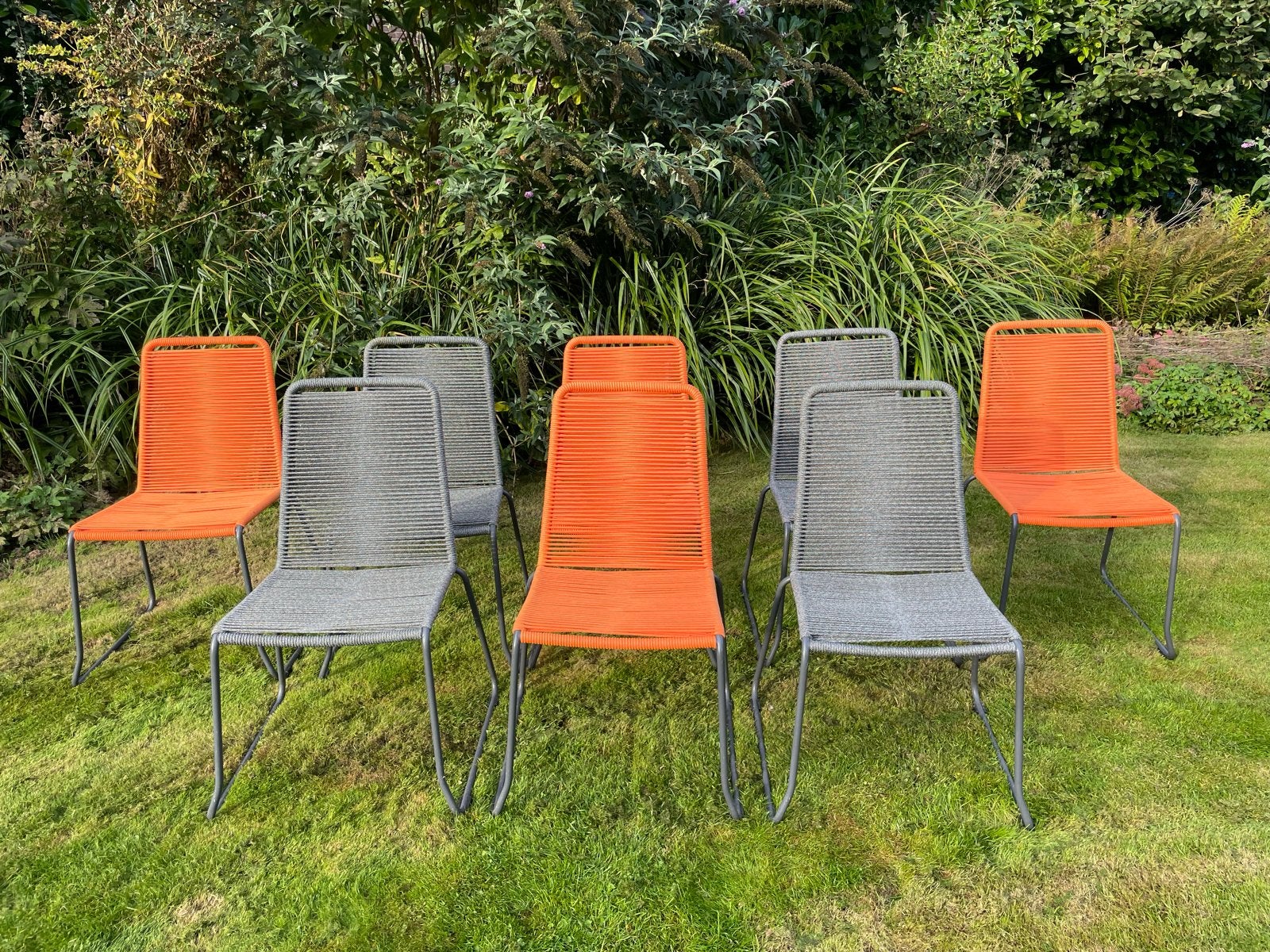 Suns tuinstoelen - 8 stuks (oranje en grijs), Tuin en Terras, Ophalen, Gebruikt, Textileen, Stapelbaar