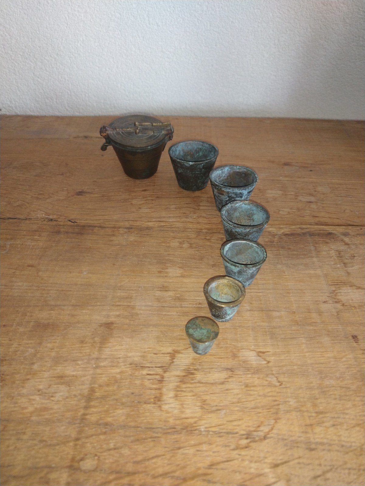Antieke koperen nestgewichten set in doosje, Ophalen of Verzenden