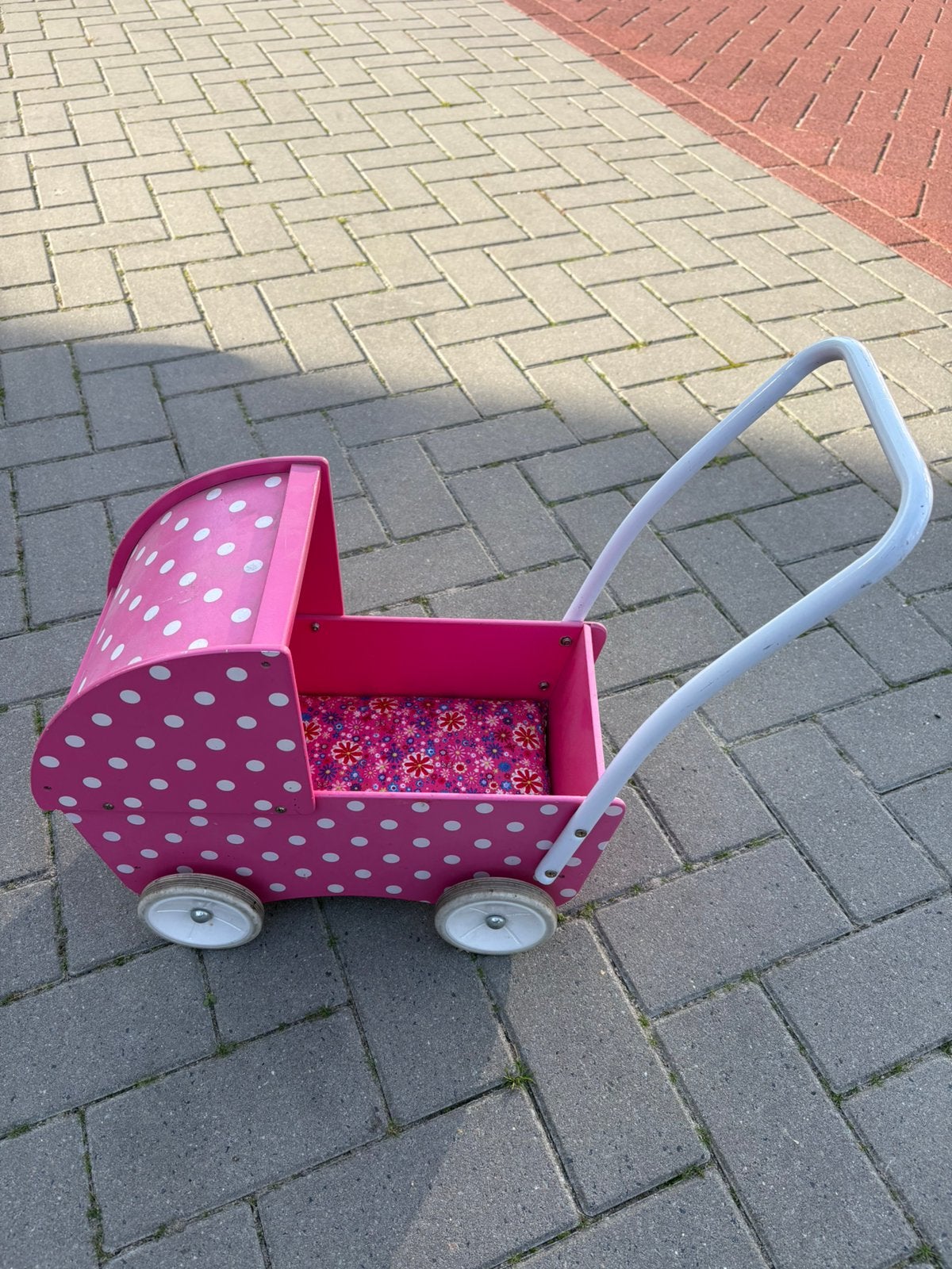 Houten poppenwagentje, Ophalen, Gebruikt