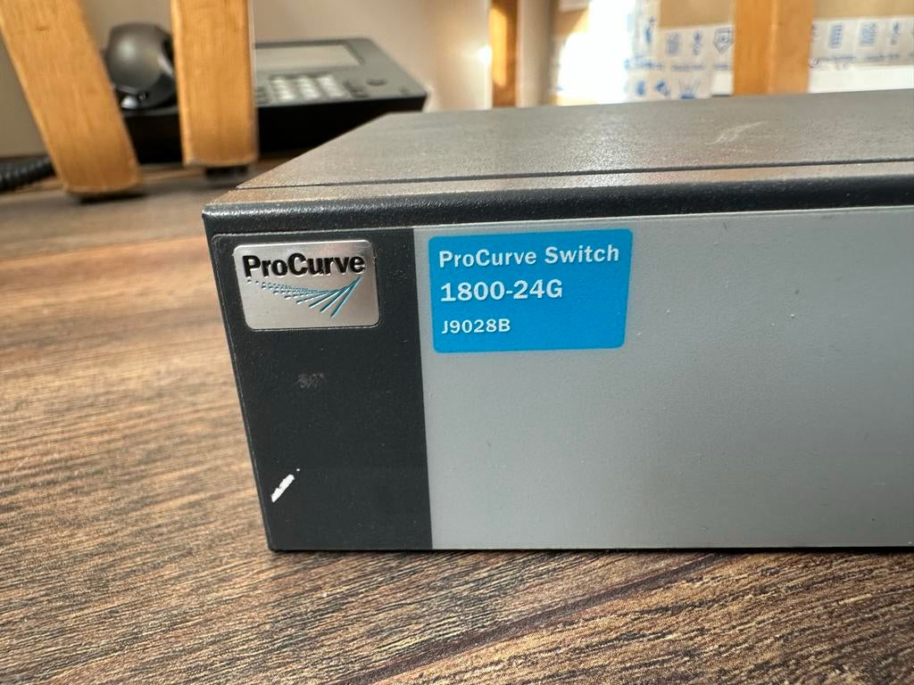 ProCurve Switch 1800-24G, Ophalen, Zo goed als nieuw