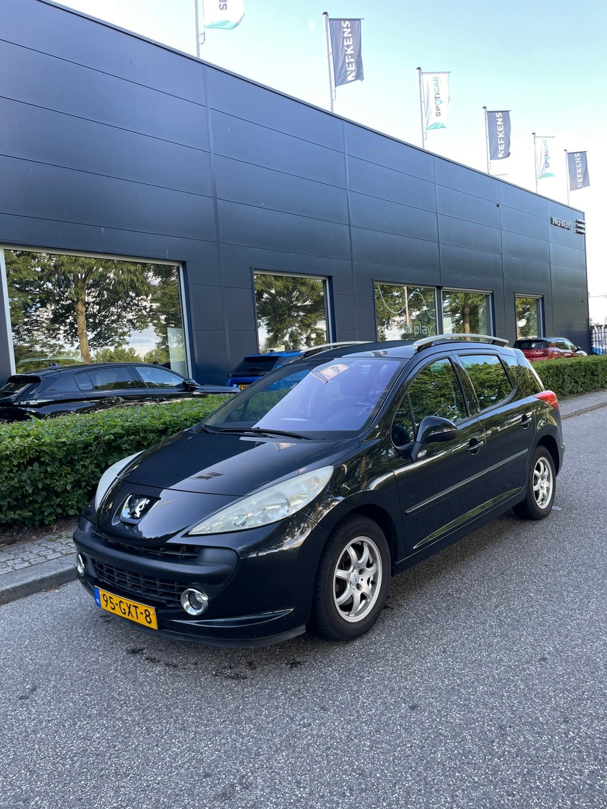 Peugeot 207 1.6 16V SW Outdoor 2008 Zwart, Auto's, Voorwielaandrijving, Parkeersensor, 4 cilinders, Overige bekleding