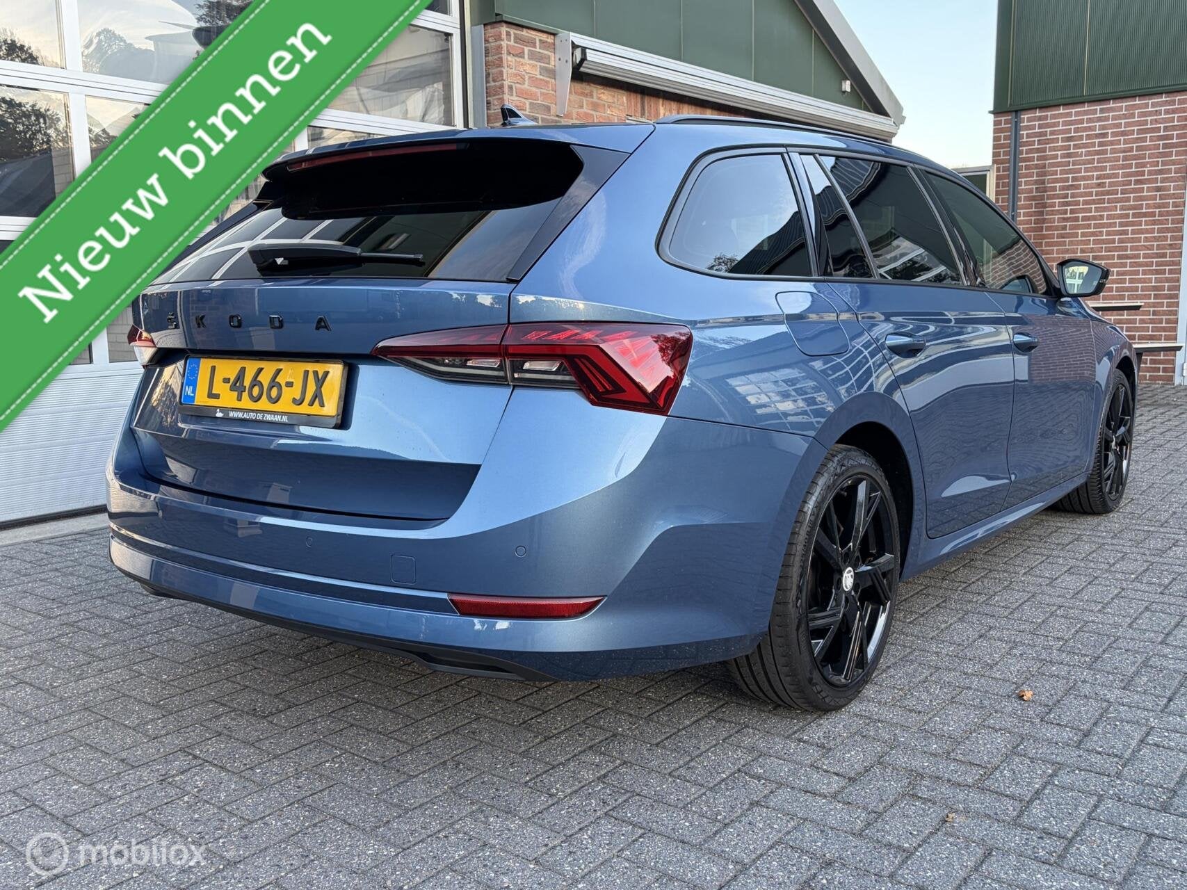 Skoda Octavia Combi 1.0 TSI Sport Business|Wegklapbare Trekh, Auto's, Voorwielaandrijving, Dealer onderhouden, Gebruikt, Euro 6