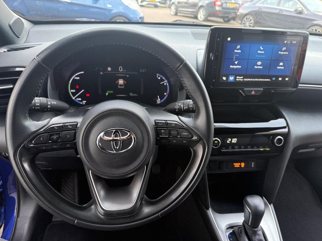 Toyota Yaris Cross 1.5 Hybrid First Edition *ALL-IN PRIJS*, 12 maanden, Stof, Gebruikt, Blauw
