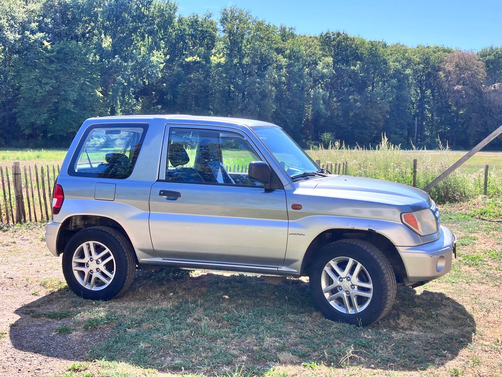 Mitsubishi Pajero 1.8 16V MPI 3DRS 2003 Grijs, Auto's, Mitsubishi, Stof, 4 cilinders, 1834 cc, 4 stoelen
