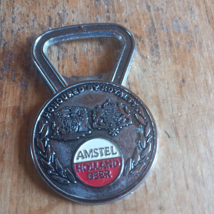 AMSTEL- flessenopener, Ophalen of Verzenden, Zo goed als nieuw, Glas of Glazen, Amstel