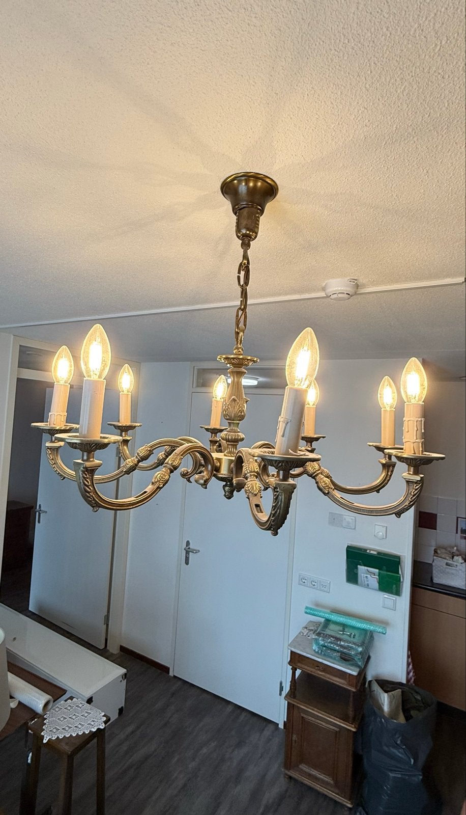 Bronze kroonluchter met Philips LED kaarslampen, Ophalen