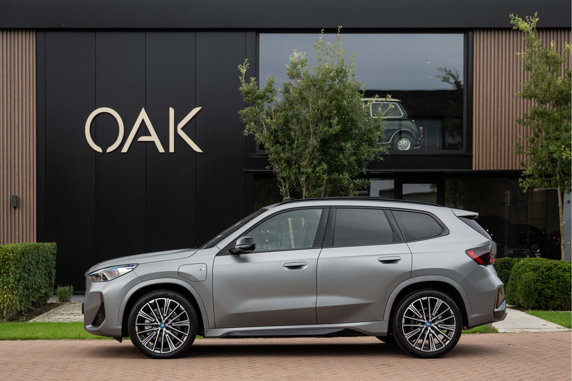 BMW X1 xDrive30e | M-Sport | Live Cockpit | Panorama | Leder, Auto's, Gebruikt, Zwart, Bedrijf, Hybride Elektrisch/Benzine