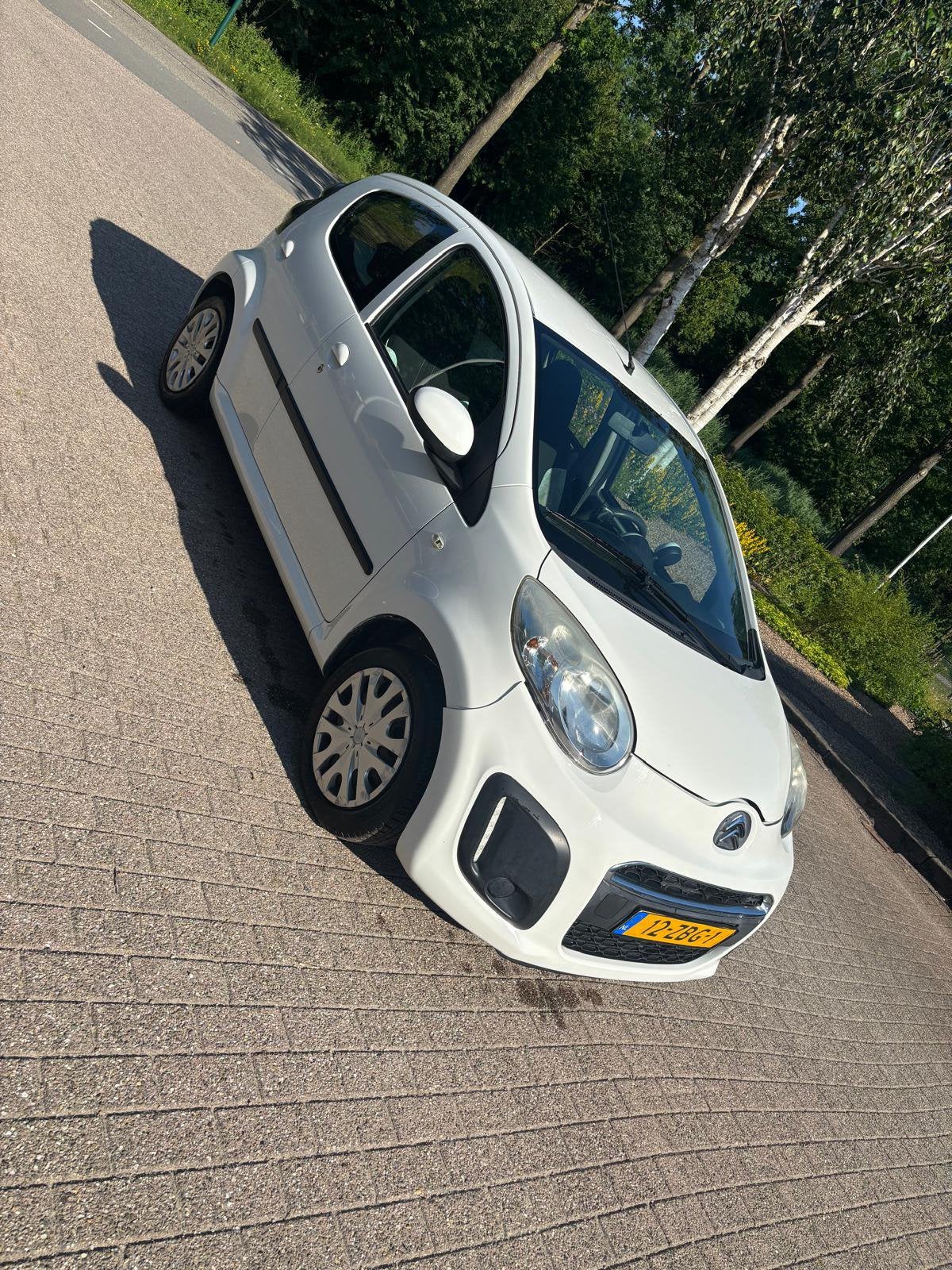 Citroën C1 1.0i 68PK 5D 2012 Wit, Voorwielaandrijving, Stof, Zwart, 4 stoelen