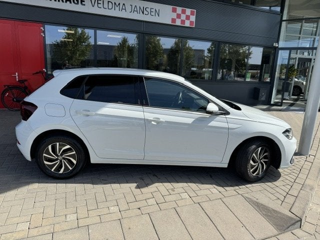 Volkswagen Polo 1.0 TSI LIFE BUSINESS (bj 2023), Auto's, Voorwielaandrijving, Stof, Gebruikt, Euro 6