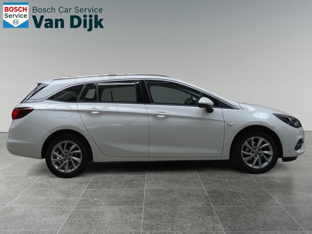 Opel Astra Sports Tourer 1.2 110pk Elegance/Trekhaak/Carplay, Auto's, Voorwielaandrijving, Gebruikt, Euro 6, Wit