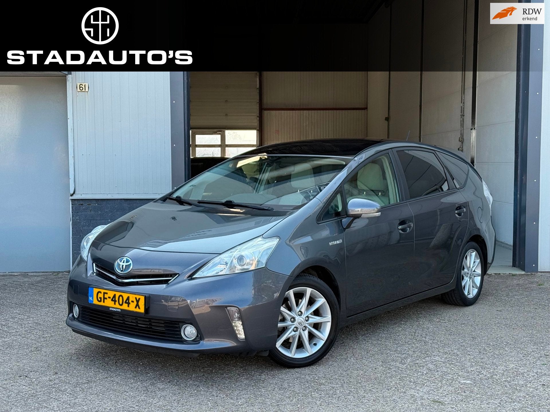 Toyota Prius Wagon 1.8 Dynamic Full Hybrid 7P Pano|Camera|Na, Auto's, Toyota, Stof, Beige, 4 cilinders, 7 stoelen