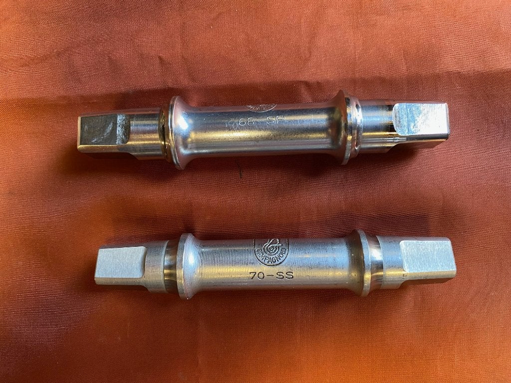 Campagnolo trapas nieuw 70-SS en gebruikte trapas 68SP, Overige typen, Ophalen of Verzenden, Racefiets, Nieuw