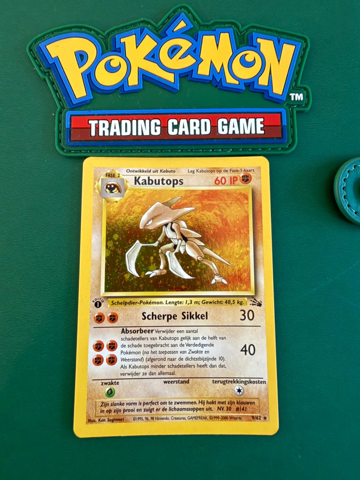 Kabutops Fossil Holo 1st Edition 9/62 Dutch, Ophalen of Verzenden, Zo goed als nieuw, Losse kaart, Foil