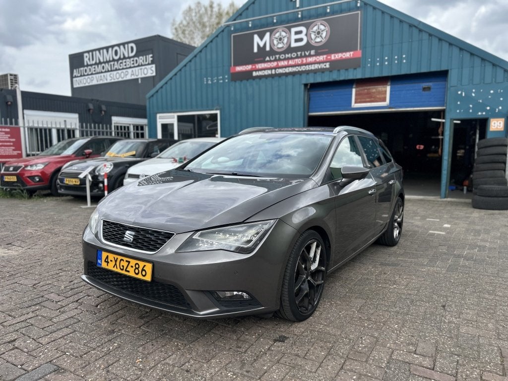 SEAT Leon ST 1.6 TDI XENON PDC NAVI LUXE (bj 2014), Auto's, Voorwielaandrijving, Euro 5, Stof, Gebruikt