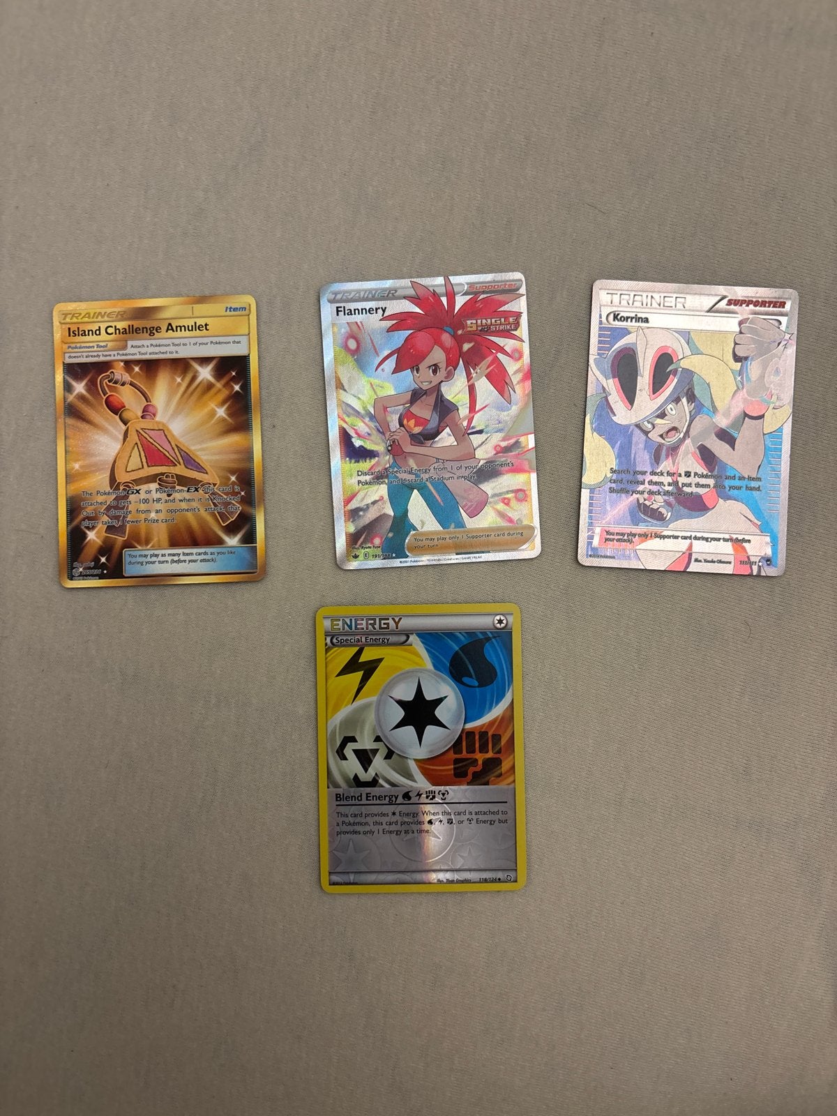 Pokémon kaarten: Flannery, Island Challenge Amulet, Blend En, Ophalen of Verzenden, Zo goed als nieuw, Meerdere kaarten, Foil
