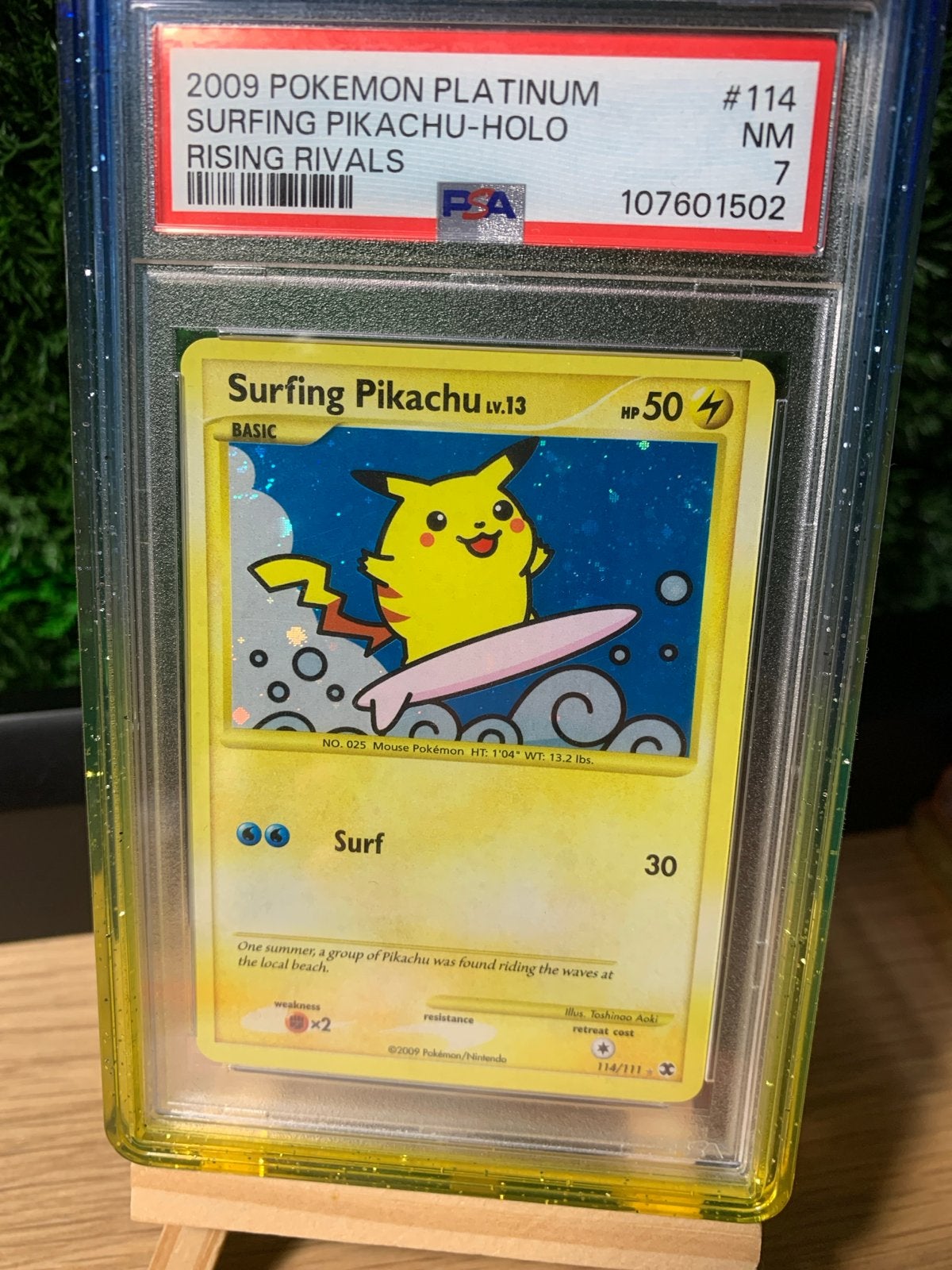 2009 Pokémon Platinum Surfing Pikachu Holo PSA 7, Ophalen of Verzenden, Zo goed als nieuw, Losse kaart, Foil