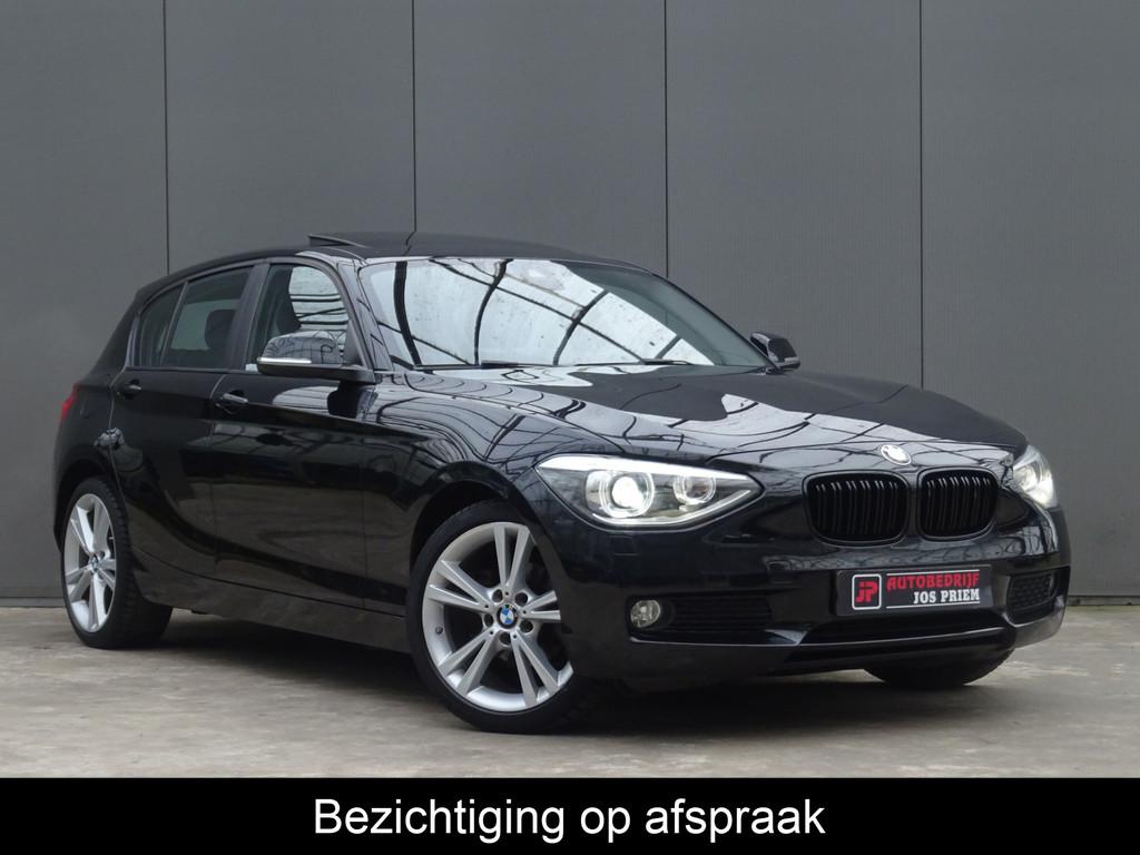 BMW 1-serie 116i Limited Edition * OPEN DAK * PDC * GR NAVIA, Euro 5, Gebruikt, 4 cilinders, Zwart