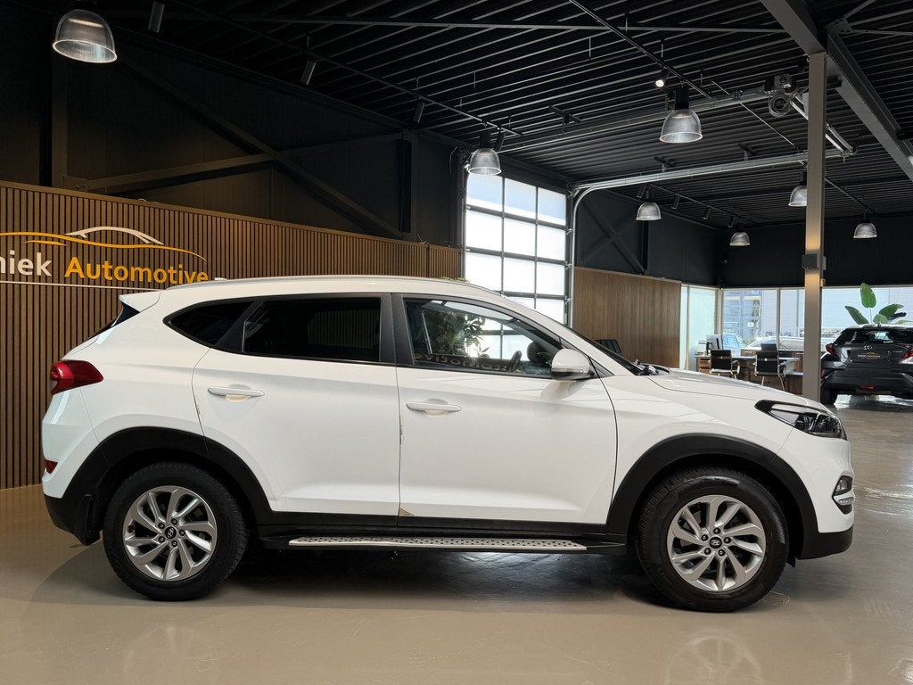 Hyundai Tucson 1.6 GDi Comfort cruise/climate control en nav, Auto's, Hyundai, Voorwielaandrijving, Gebruikt, 4 cilinders, Leder en Stof