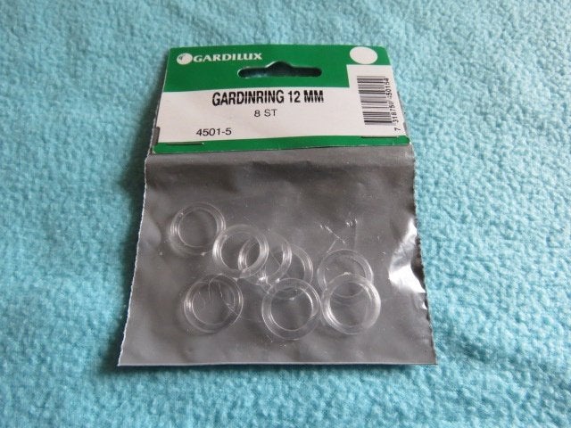 1 EURO OF GRATIS 8 plastic gordijnringen 12 mm doorsn NIEUW, Ophalen, Nieuw, Overige typen