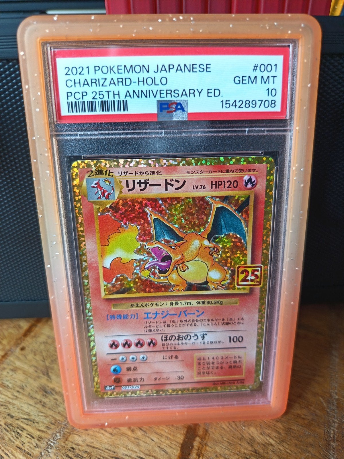 Pokémon Charizard 25th Anniversary #001 PSA 10, Ophalen of Verzenden, Nieuw, Losse kaart, Foil
