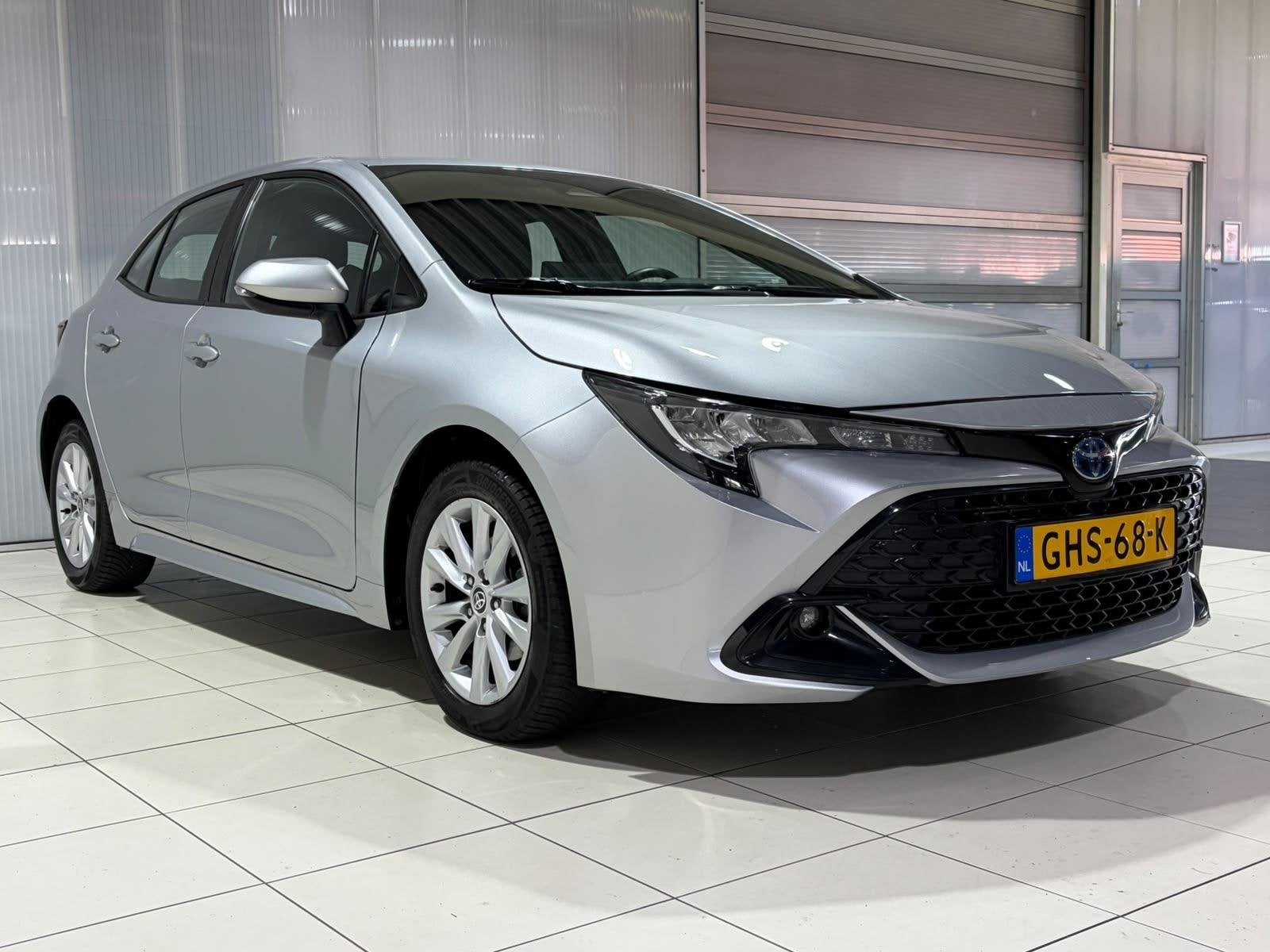 Toyota Corolla Hybrid 140 Active All Season Banden, Camera,, Auto's, Dealer onderhouden, Gebruikt, 4 cilinders, Corolla