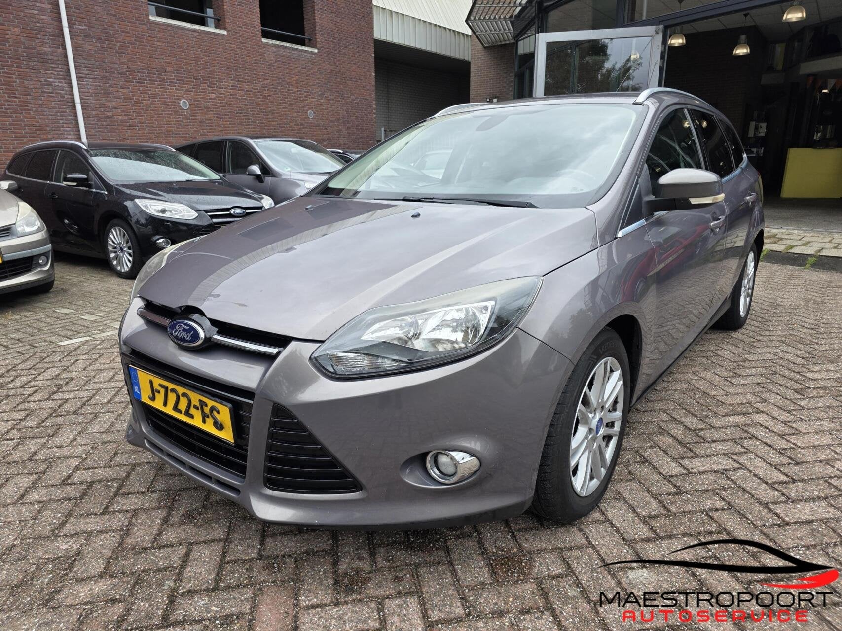 Ford Focus Wagon 1.0 EcoBoost Titanium, Auto's, Ford, 125 pk, Gebruikt, Bruin, Handgeschakeld