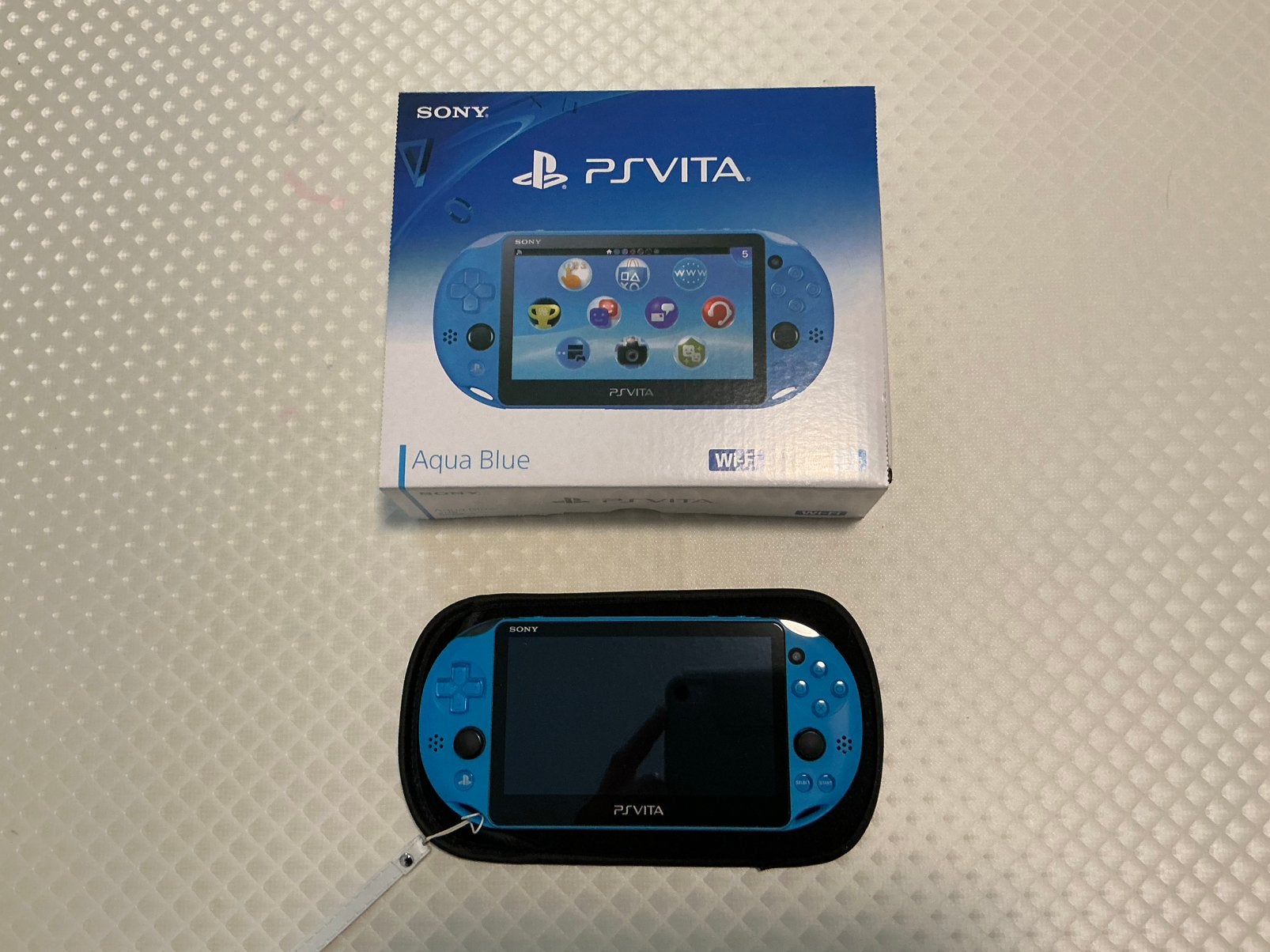 Sony PS Vita Aqua Blue, Ophalen of Verzenden, Zo goed als nieuw, Blauw, Met games