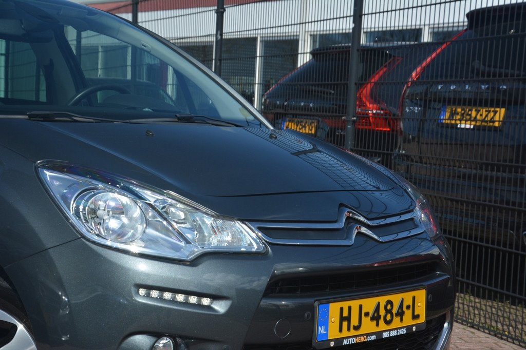 Citroën C3 1.2 PureTech Exclusive | Automaat | Navigatie |, Auto's, Stof, 1199 cc, 82 pk, Origineel Nederlands