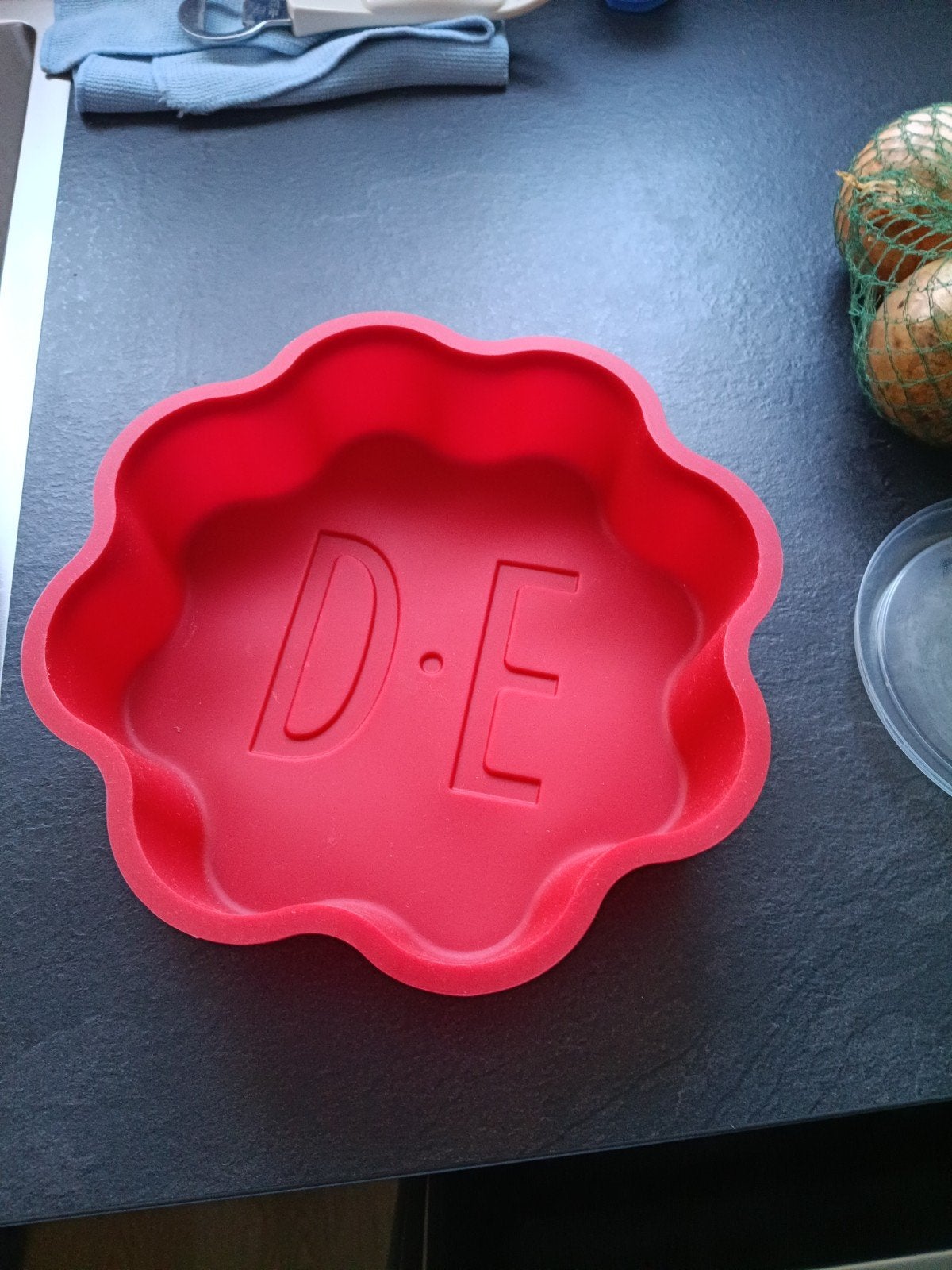 Rode siliconen bakvorm met DE-logo, Ophalen of Verzenden, Rood, Overige merken, Rubber/elastomeren