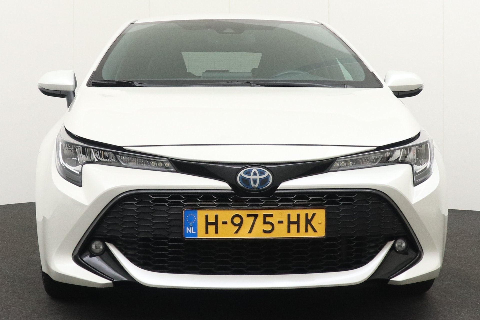 Toyota Corolla 1.8 Hybrid Business Plus Carplay Adapt. Cruis, Auto's, Gebruikt, 4 cilinders, Stoelverwarming, Corolla