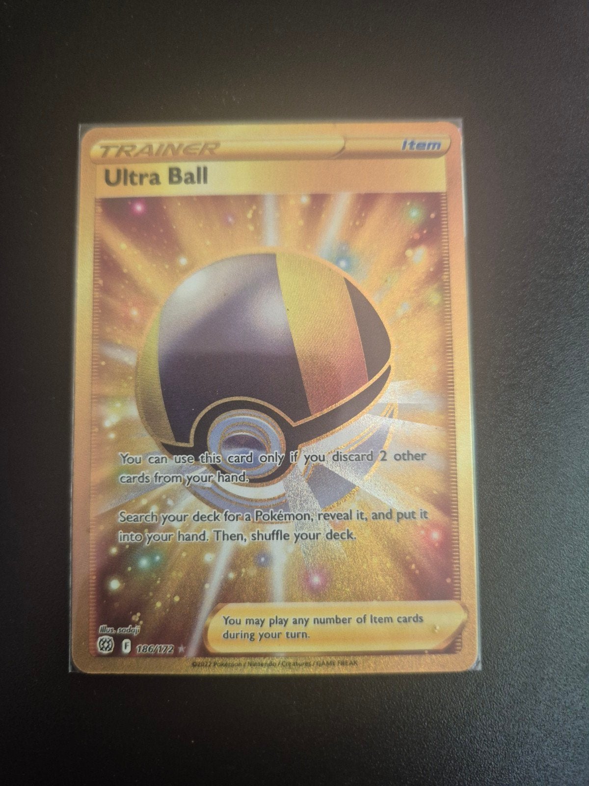 Pokémon Ultra Ball Gold Secret Rare 186/172, Ophalen of Verzenden, Zo goed als nieuw, Losse kaart
