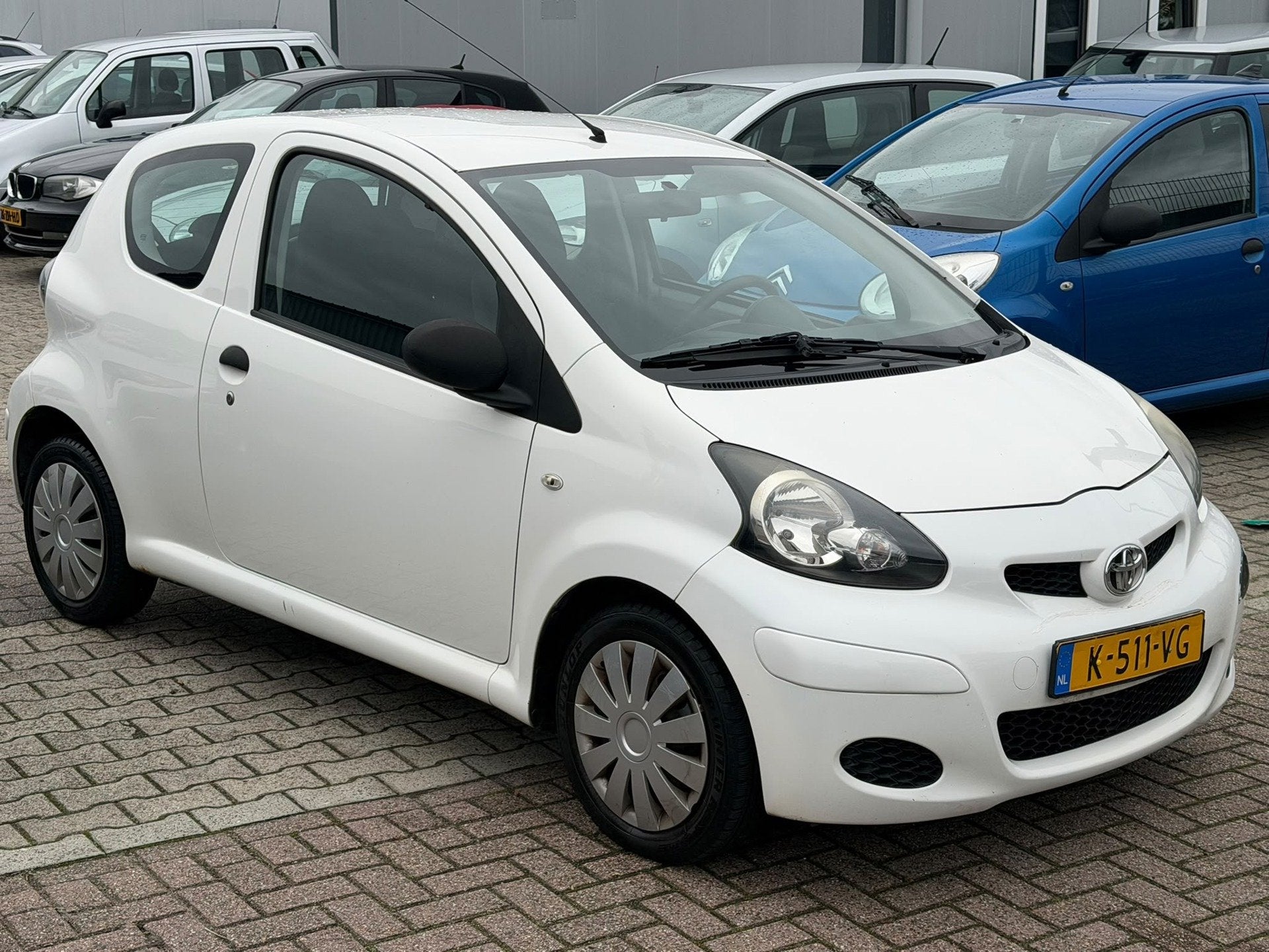 Toyota Aygo 1.0-12V Aspiration Green 2011 APK 11-2027, Auto's, Voorwielaandrijving, Gebruikt, 4 stoelen, Alcantara
