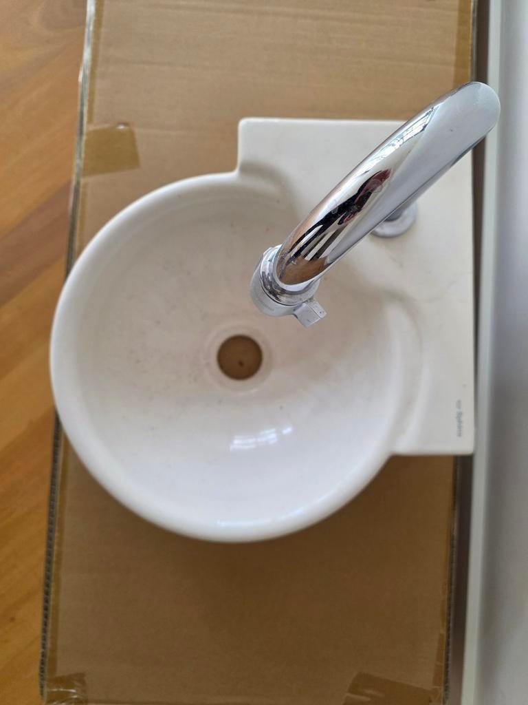 Hoekfontein Sfinx met kraan voor toilet, Ophalen