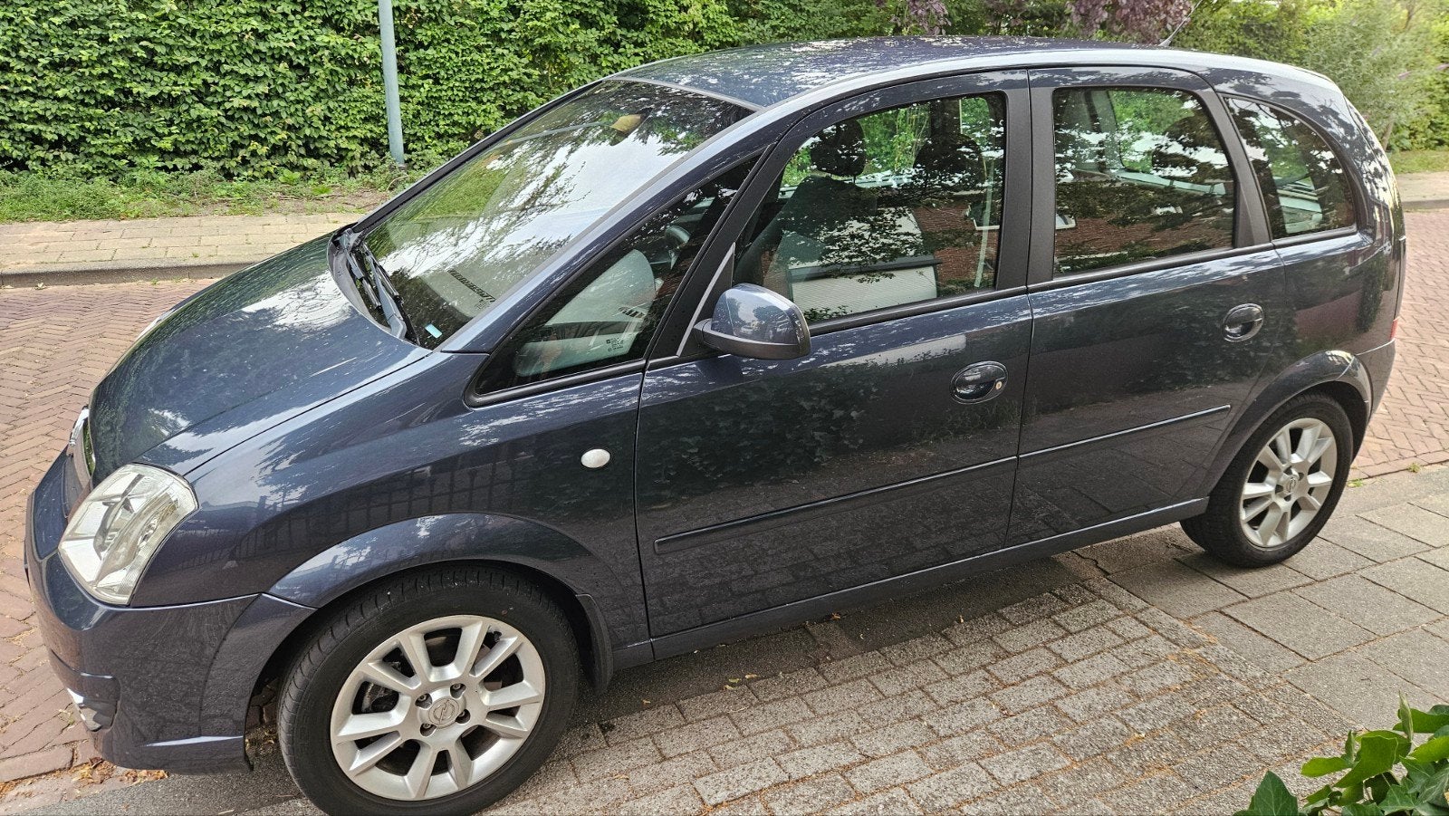 Opel Meriva 1.6 16V 77KW 2009 Grijs, Auto's, Opel, Voorwielaandrijving, Zwart, 4 cilinders, Blauw