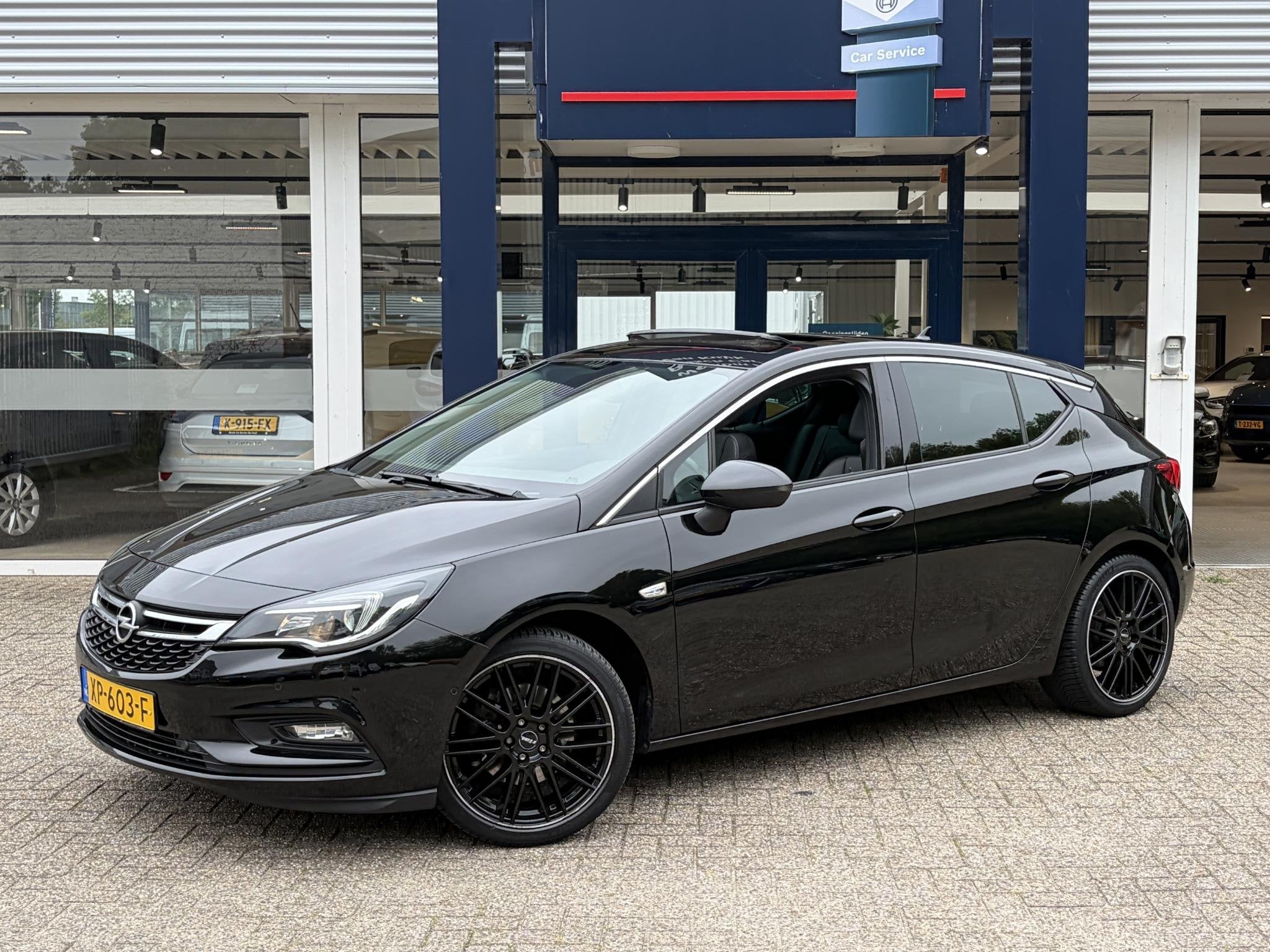 Opel Astra 1.6 Turbo Business Executive / Automaat / 200 PK, Auto's, Gebruikt, 4 cilinders, Zwart, Bedrijf