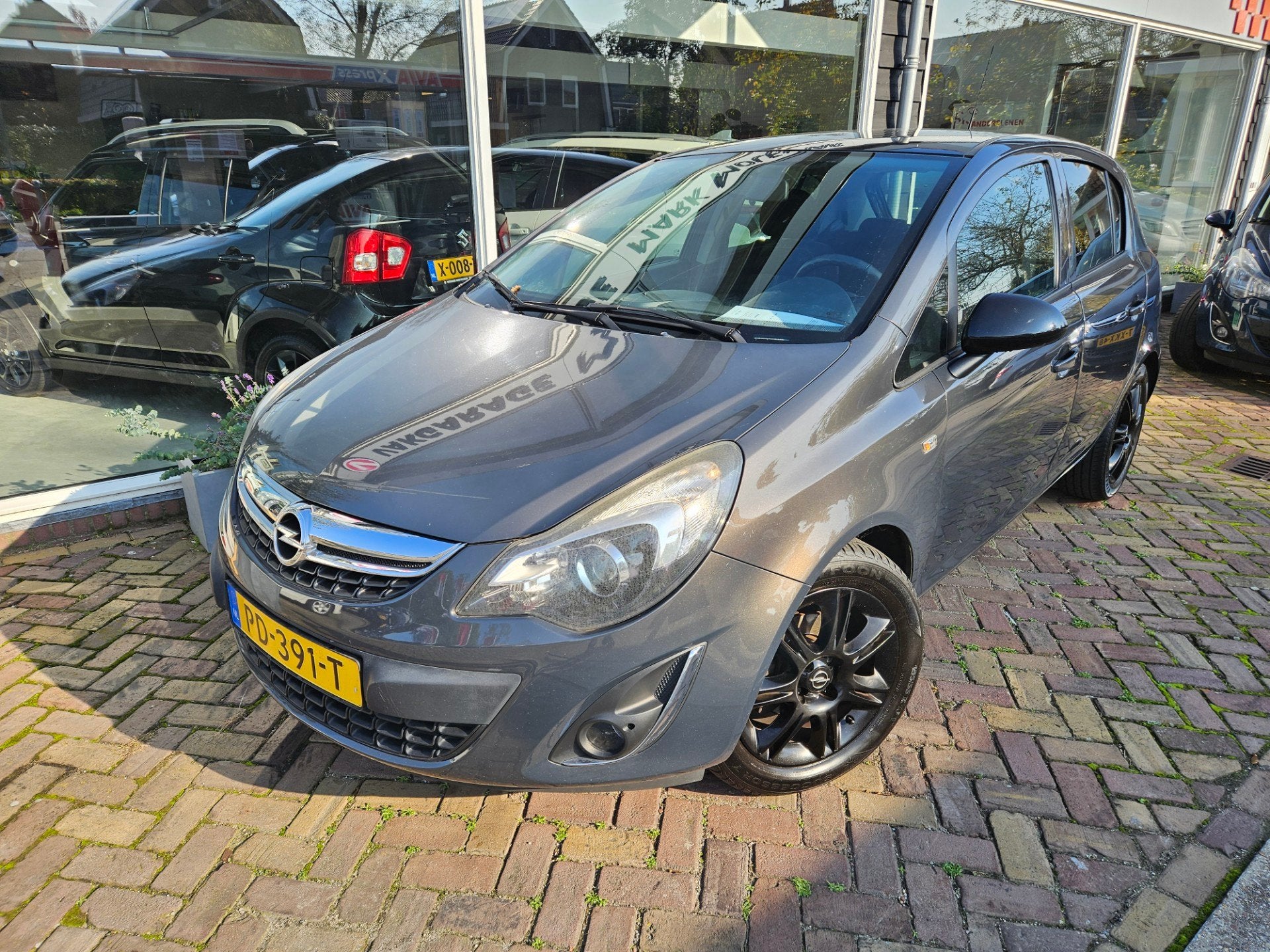 Opel Corsa 1.4-16V Design Edition,sportieve look,telefoon,na, Auto's, Voorwielaandrijving, Euro 5, Gebruikt, 1398 cc