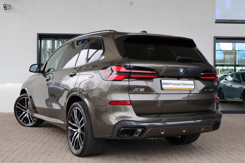 BMW X5 xDrive50e M Sport Pro | Driving Assistant Professiona, Auto's, BMW, Gebruikt, 2395 kg, Met garantie (alle), Bedrijf