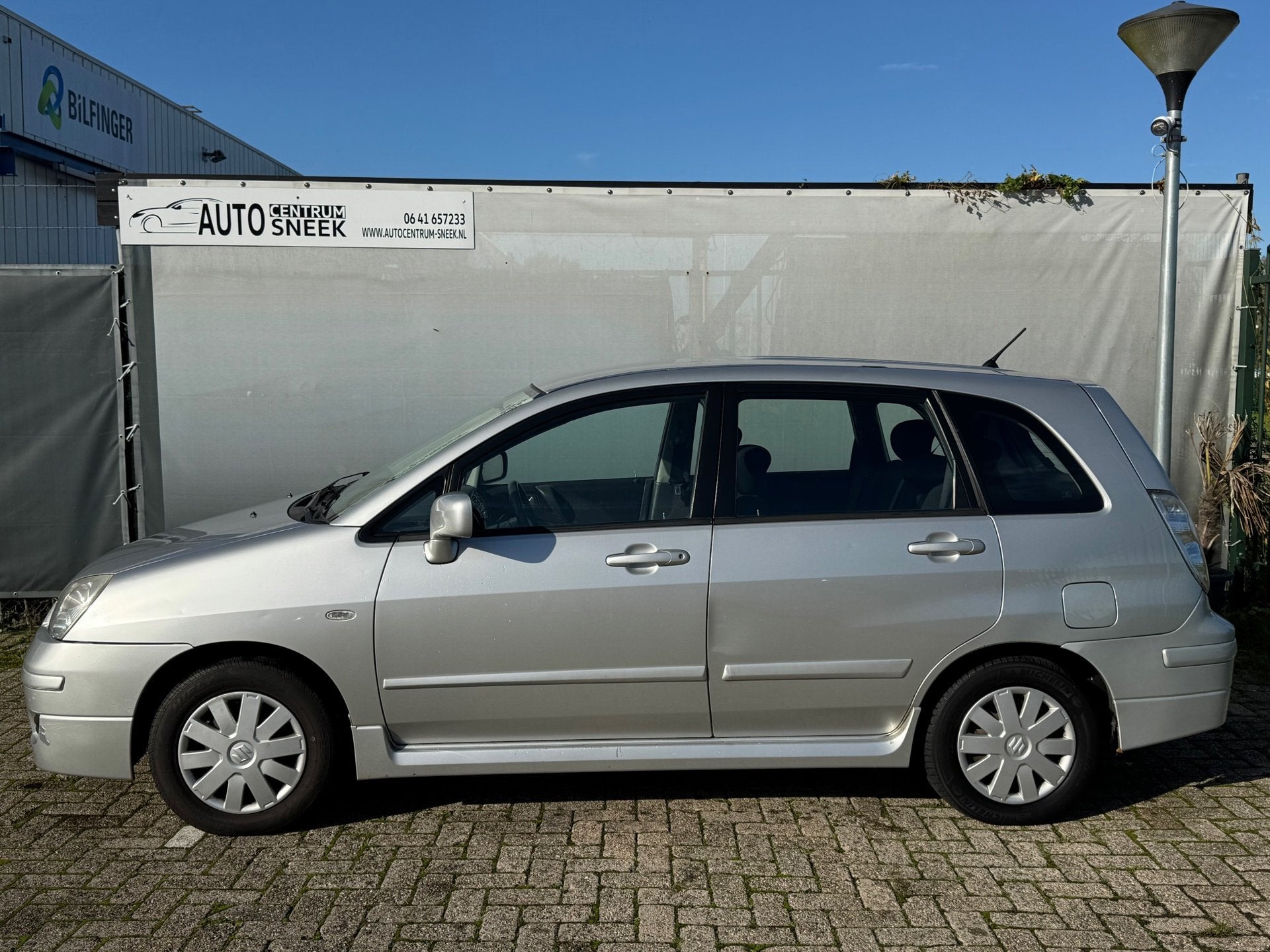 Suzuki Liana 1.6 GLS - NWE APK - Airco - Elektr ramen, Auto's, Voorwielaandrijving, Stof, Zwart, 4 cilinders