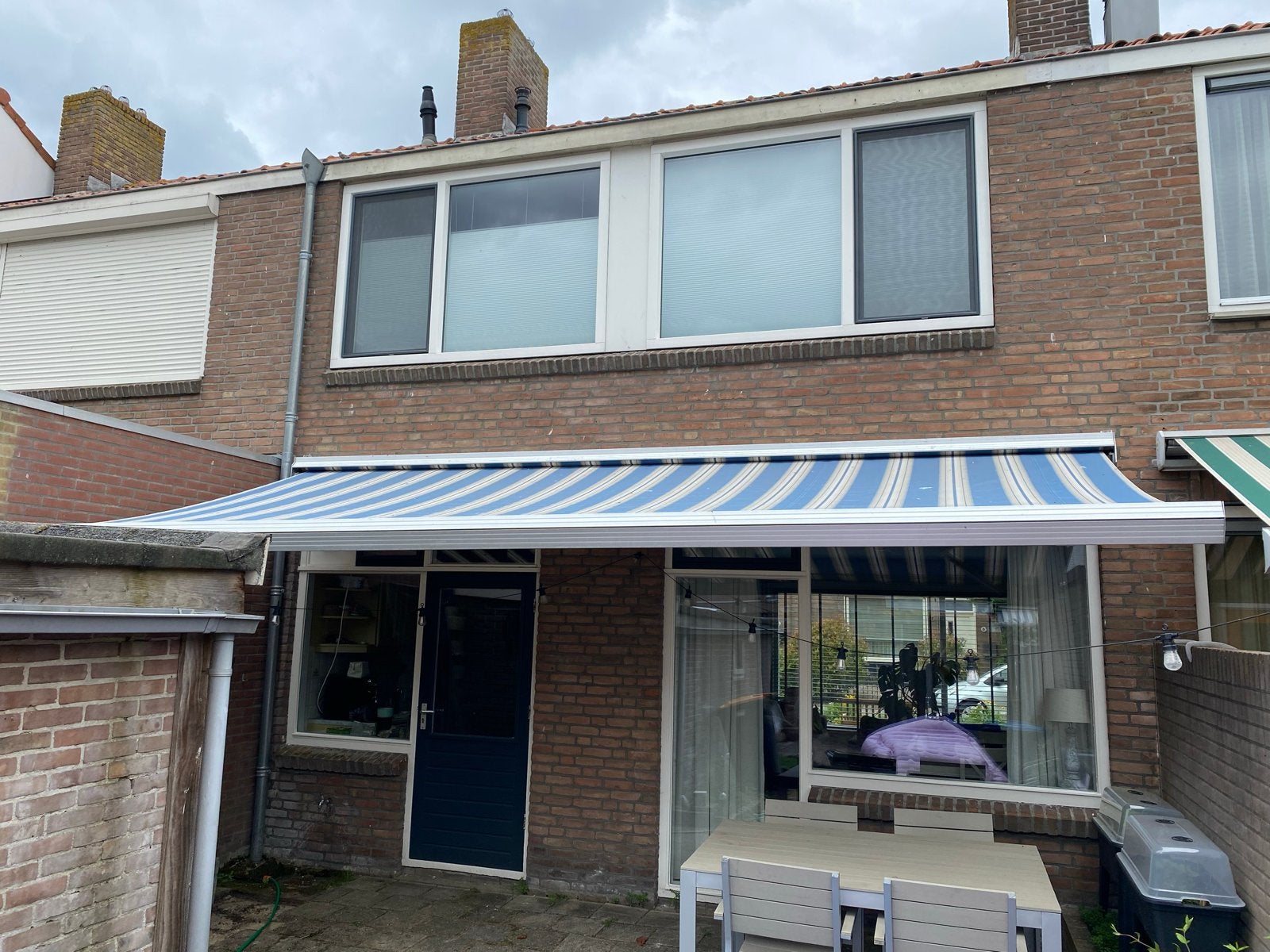 Net elektrisch Knikarmscherm - 5,65m breed - uitval 3m, Tuin en Terras, Zonneschermen, Ophalen, Gebruikt, 450 cm of meer, Elektrisch
