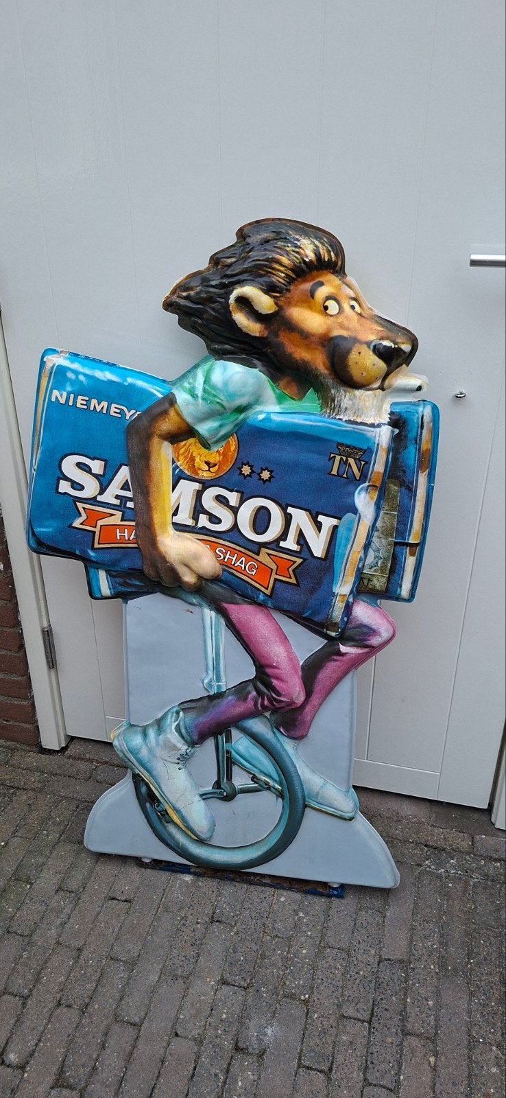 Dubbelzijdige Samson Mascotte topstaat, Ophalen, Reclamebord