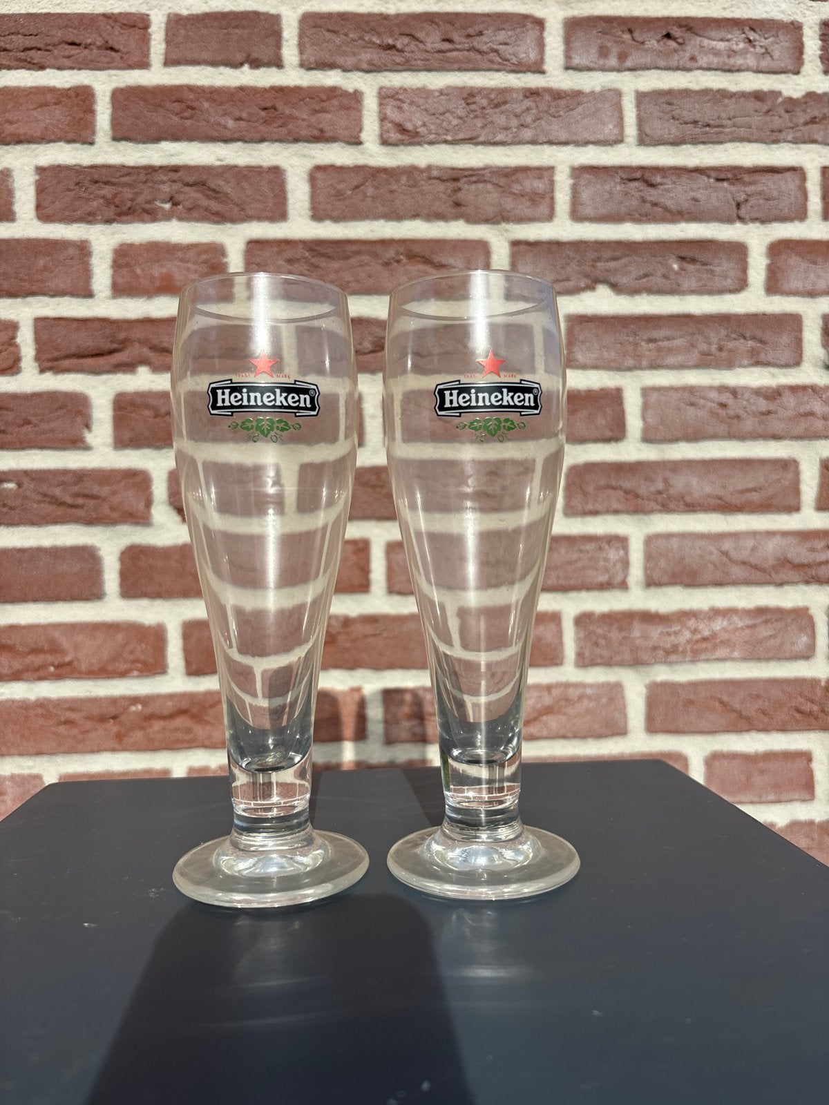 Set van 2 Heineken bierglazen, Ophalen of Verzenden, Gebruikt, Glas of Glazen, Heineken