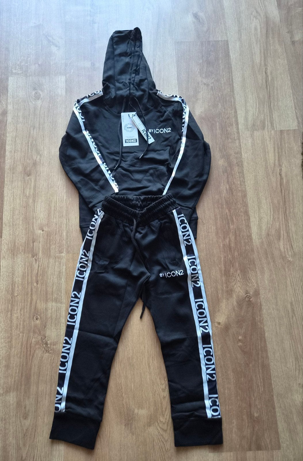 ICON trainingspak zwart maat 152 - Nieuw, Maat XS of kleiner, Verzenden, Nieuw, Trainingspak