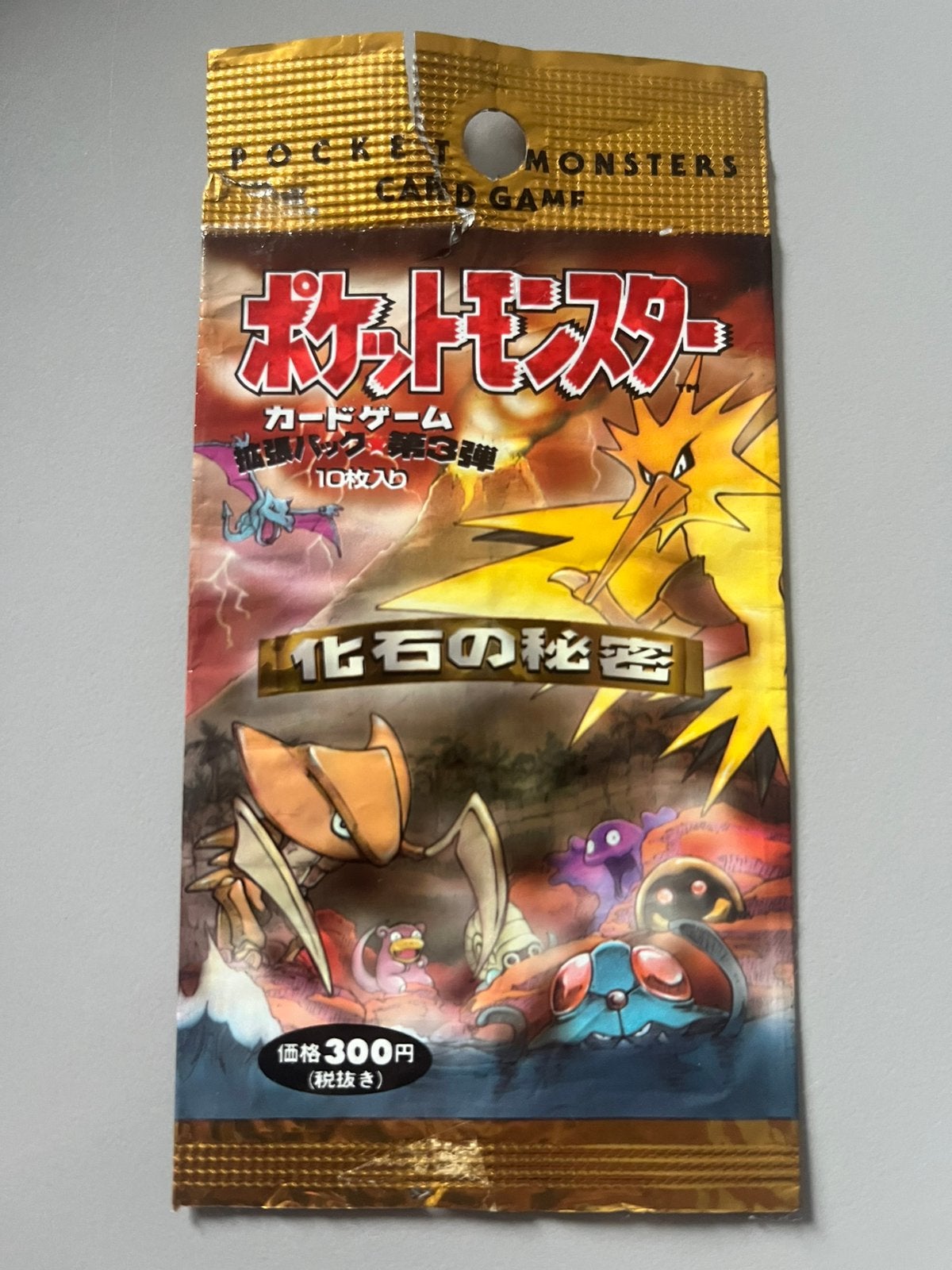 Pokemon booster empty fossil japanese 1996, Ophalen of Verzenden, Gebruikt, Booster